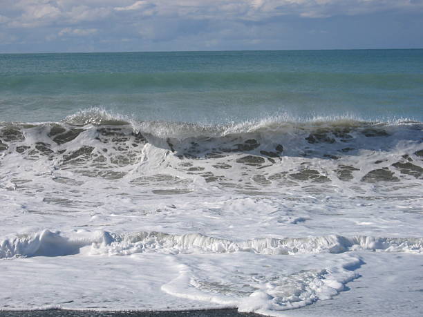 Foamy wave stock photo