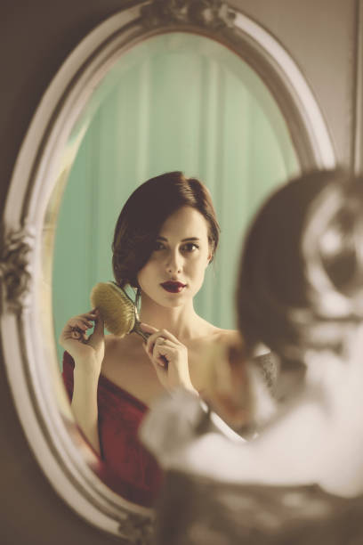 istock young woman with comb 924627322