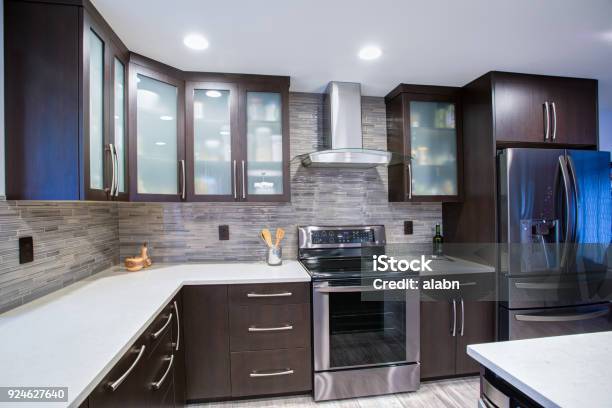 Updated Contemporary Kitchen Room Interior In White And Dark Tones Stock Photo - Download Image Now