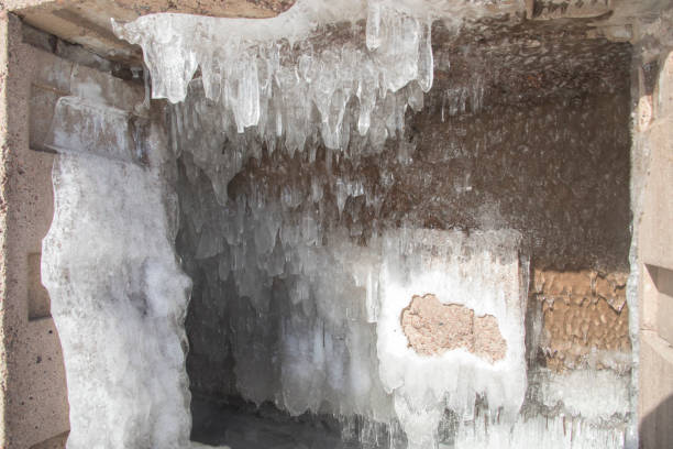 Interior doors of icecles covering The Cribs on frozen Lake Superior in Duluth, Minnesota in winter.