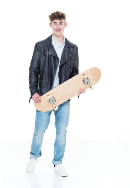 istock Handsome young teenager holding a skateboard 924628000