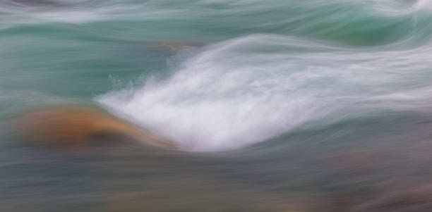 istock Flowing Athabasca River Blur at Jasper National Park, Canada 924628242