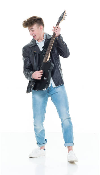 istock Handsome young male playing an electric guitar 924636046