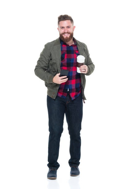 istock Cool guy with jacket and red shirt with phone and coffee 924639930