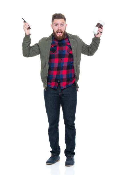 istock Cool guy with jacket and red shirt with phone and coffee 924639956