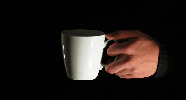 istock White Coffee Mug being Held by Caucasian Male 92464008