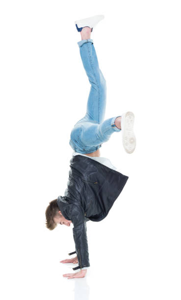 istock Attractive young man doing cartwheel 924648370