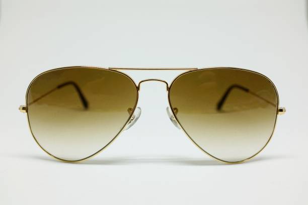 istock Chic sunglasses with brown aluminium frame isolated on white background, front view 924648468