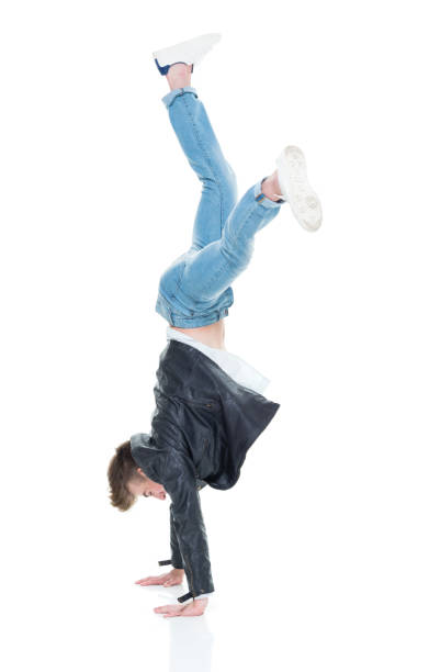 istock Attractive young man doing cartwheel 924648580