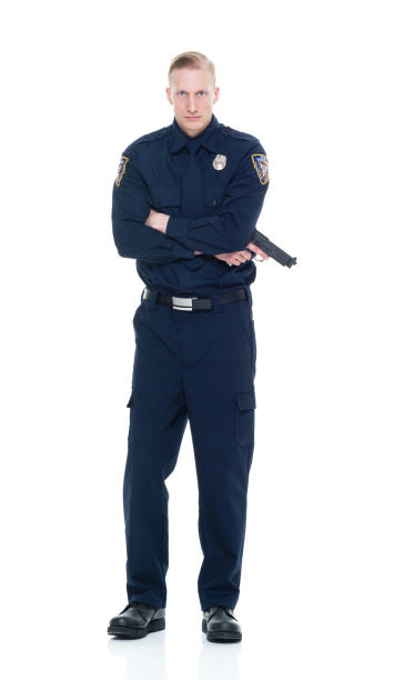 istock Handsome and friendly police officer standing with gun 924648798