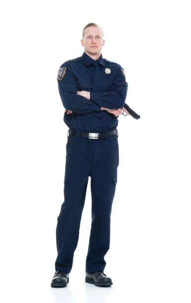 istock Handsome and friendly police officer standing with gun 924648800
