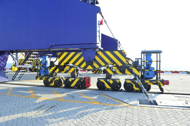 istock Port crane bridge and bulk carrier 924652190