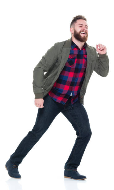 istock Man in bomber jacket and plaid shirt acting silly 924652506