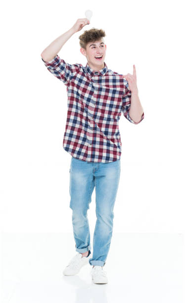 istock Trendy young male holding a lightbulb for idea concept 924652550