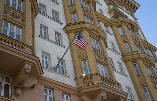The US national flag on the building of the Embassy of the United States of America in Moscow.
