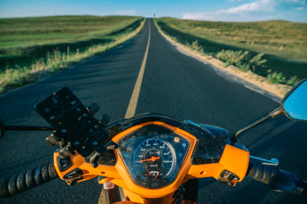 istock Motorcycles cross the prairie Road 924663550