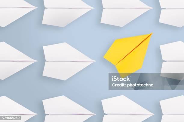 Change Concepts With Yellow Paper Airplane Stock Photo - Download Image Now - Change, Leadership, Business