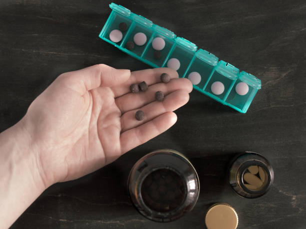 istock top view of pill box with copy space 924672706