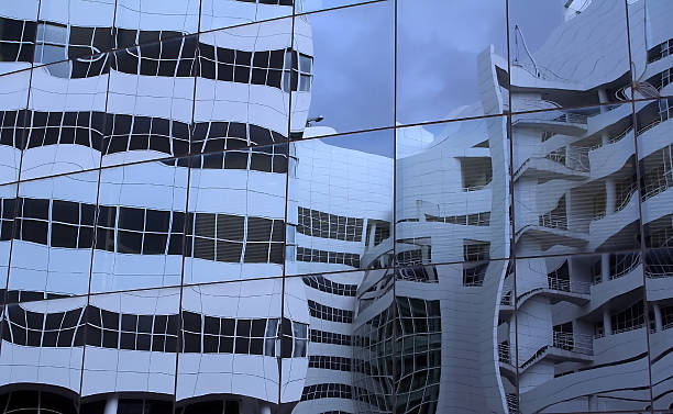 Office building reflections in blue stock photo