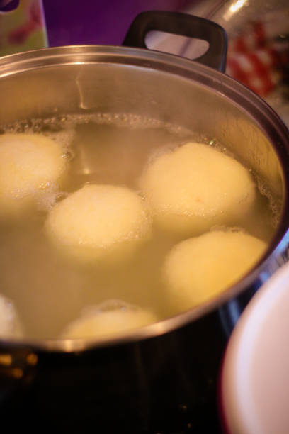 istock German Potato Dumplings simmering in pot 924677650