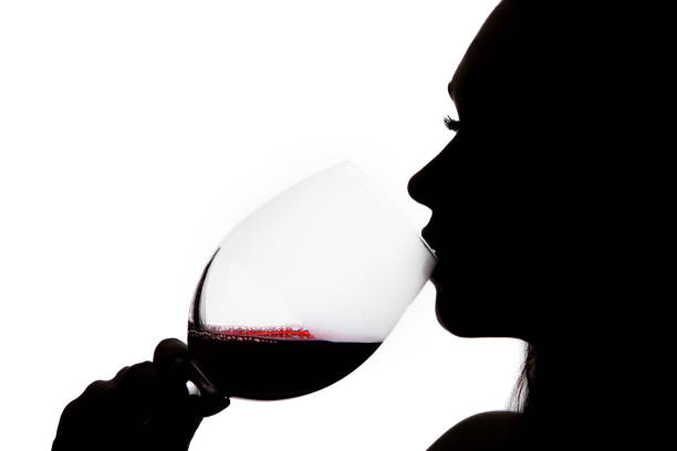 istock Silhouette of a drinking woman 924685312