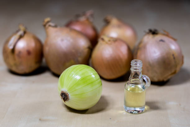 istock Onion the best specific  for influenza. Syrup prepared from onions. Black background. 924686056