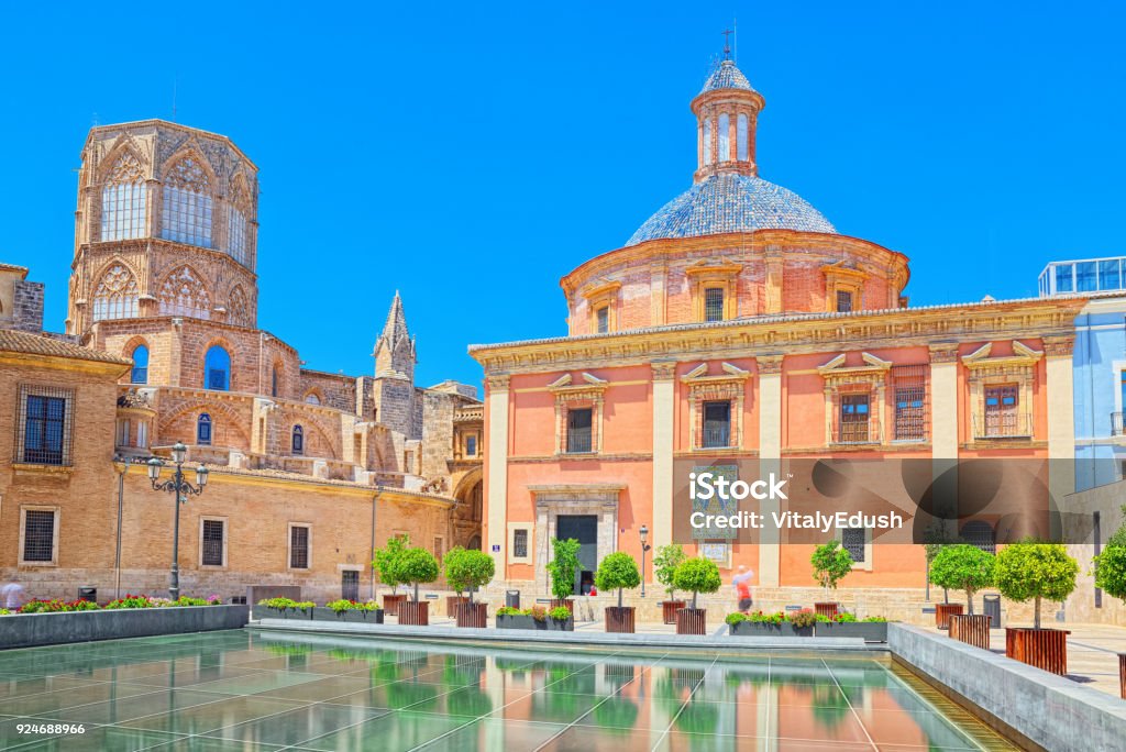Valencia, Square of the Virgin Saint Mary and Basilica of the Mother of God Helpless, Almoina Archaeological Center. Valencia, Square of the Virgin Saint Mary and Basilica of the Mother of God Helpless, Almoina Archaeological Center. Spain. Cathedral Stock Photo