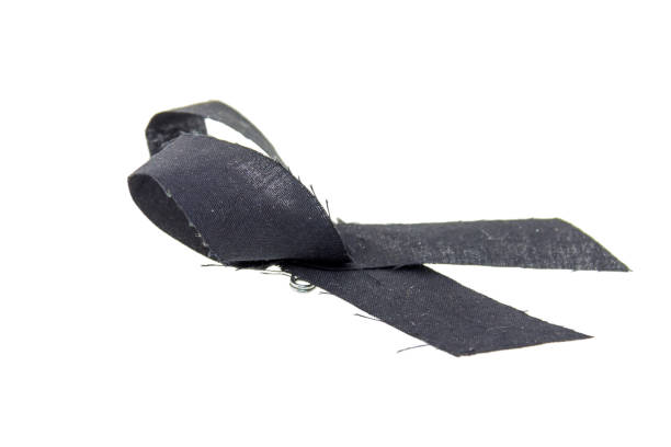 istock black ribbon for mourning concept isolated on white background 924692426