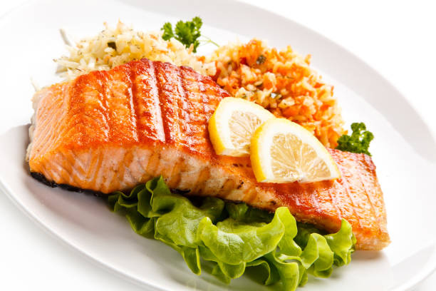 istock Fish dish - grilled salmon and vegetable salad 924692968