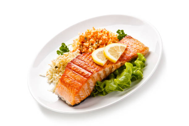 istock Fish dish - grilled salmon and vegetable salad 924692974