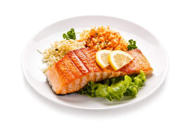 istock Fish dish - grilled salmon and vegetable salad 924692988