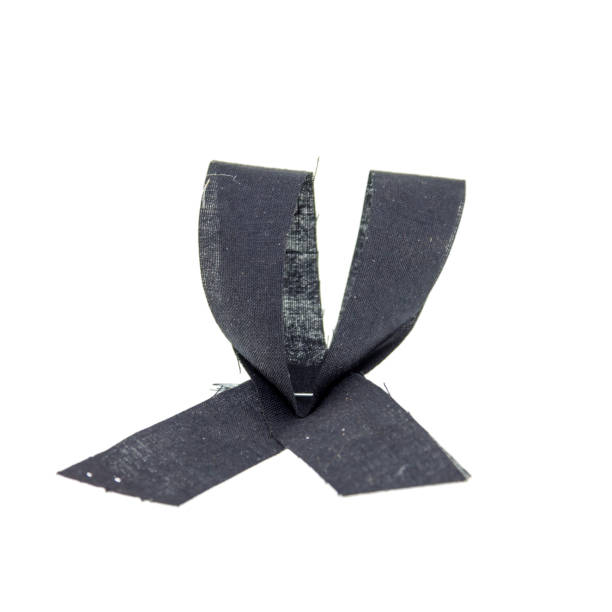 istock black ribbon for mourning concept isolated on white background 924693424