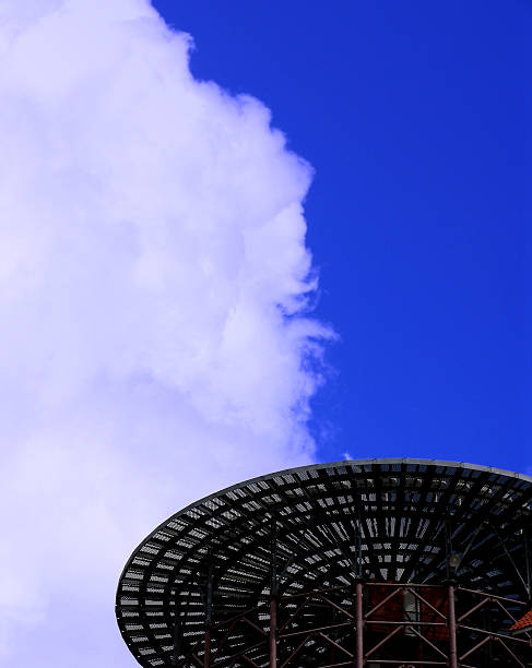 istock Weird steel saucer vs. cloudy  sky 92469401