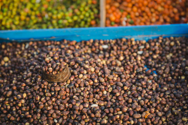 Street Food ,fried Soybean,Corn,Nuts etc with mesurement pot in the street of Nepal.