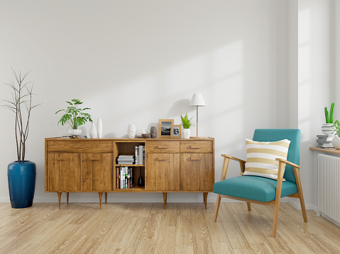 Modern mid Century and vintage interior of living room ,blue lounge chair with wood cabinet on white wall and wood floor  in front of a window ,empty room ,3d rendering