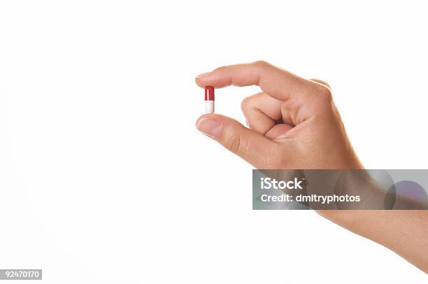 Mano E Pillole - Fotografie stock e altre immagini di Antibiotico - Antibiotico, Bianco, Capsula