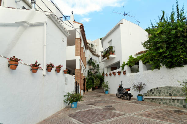 White village of Mijas in Andalusia, Costa del Sol, Spain. Quiet street in Mijas. Charming white village in Andalusia, Costa del Sol. Southern Spain. mijas pueblo stock pictures, royalty-free photos & images