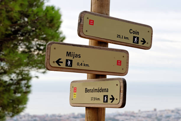 istock Wooden hiking trail signpost with multiple directions. 924705708