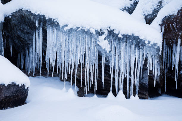 istock Row of frosty icicles in nature 924705782