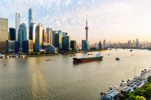 istock Shanghai skyline at sunset, China. 924706086