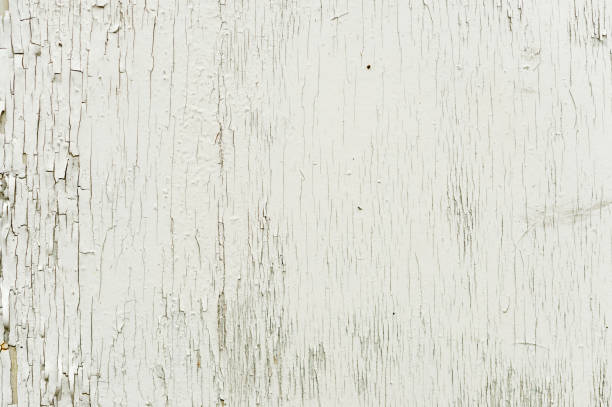 istock Textured background wooden surface painted with water-emulsion paint with small cracks in time. Rustic background 924706220