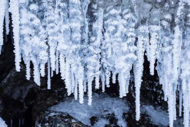 istock Row of frosty icicles in nature 924706272