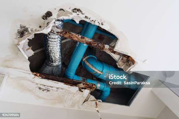 Damage Home Ceiling In Restroom Water Leak Out From Piping System Make Ceiling Damaged Stock Photo - Download Image Now