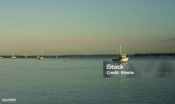 Dawn Fishing Stock Photo - Download Image Now - Beach, Catching, Coastline