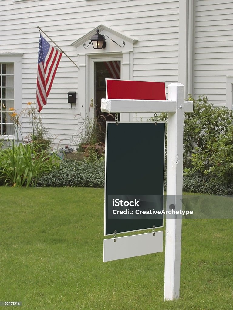 American Flag and Real Estate Sign  American Flag Stock Photo