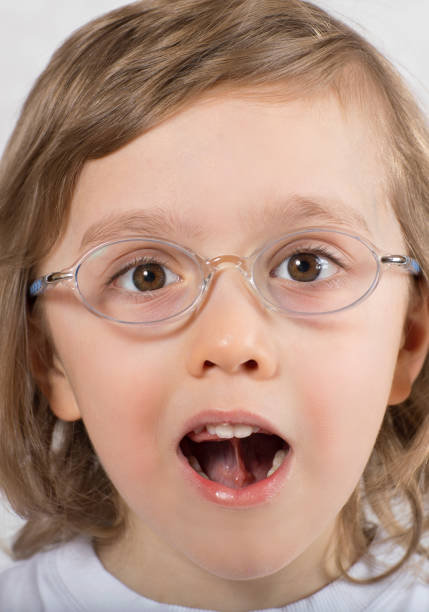 istock Boy of five years is making some tongue exercises. 924713856