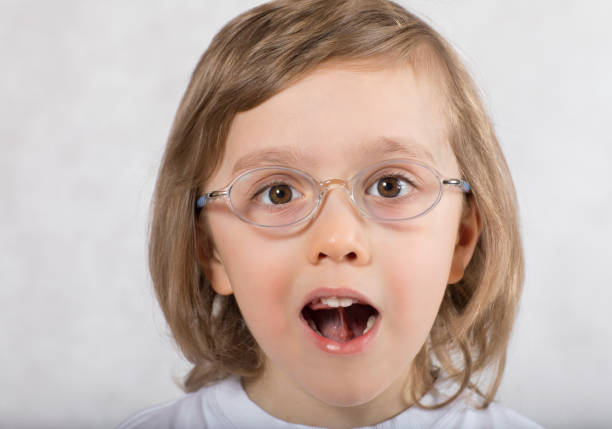 istock Boy of five years is making some tongue exercises. 924713860