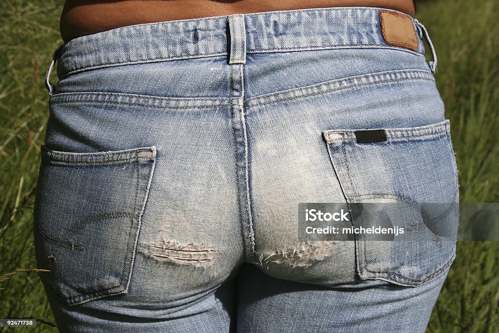Worn Out Jeans  Adult Stock Photo
