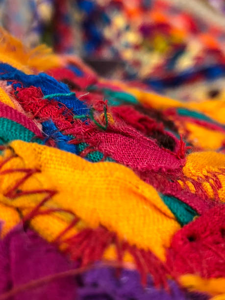 istock Colorful fabric stacks detail view close up 924717480