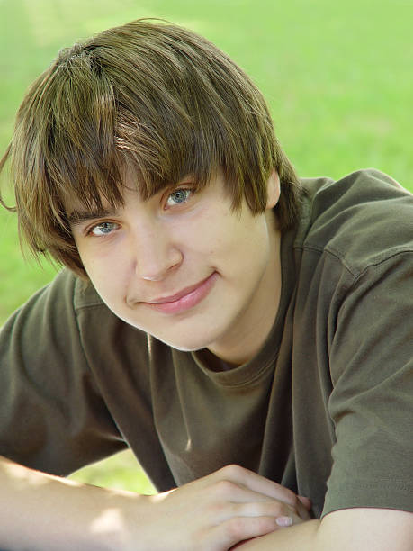istock Young teenager smiling at camera 92471784